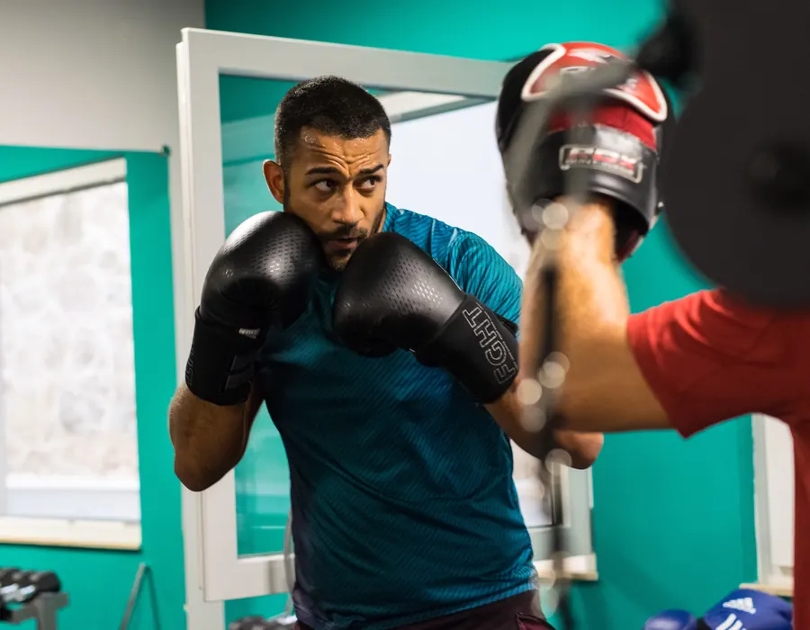 Boxing pad work with a coach at Move Better Studio, Sliema